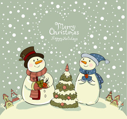 Loving couple of snowmen with gifts beside christmas tree.