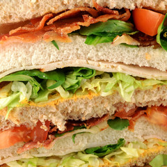 Luxury club sandwich bacon and chicken.