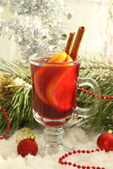Glass of mulled wine with christmas decoration