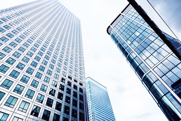 Fototapeta na wymiar Glass Skyscrapers in the City of London, Blue toned