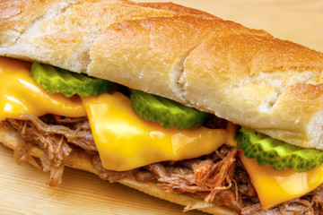 Fototapeta premium Pulled pork baguette sandwich closeup