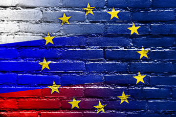 Russia and European Union Flag painted on brick wall