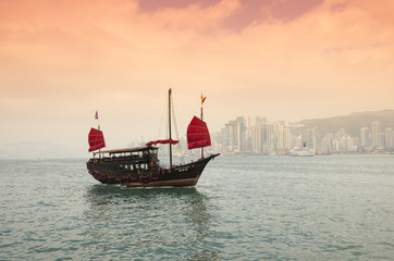 The junk boat on sunset