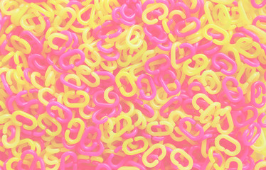 Pink and yellow plastic chain