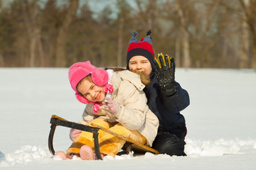 Little child playing in snow