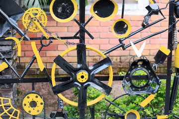 Bicycle parts on metallic door. Pokhara-Nepal. 0672