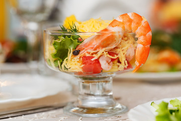 Boiled shrimp salad with cheese and vegetables.