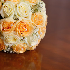 beautiful bridal bouquet of roses at a wedding party