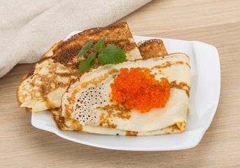 Pancakes with red caviar