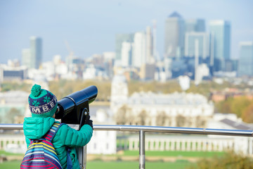 A boy looking into tower viewer