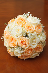 beautiful bridal bouquet of roses at a wedding party