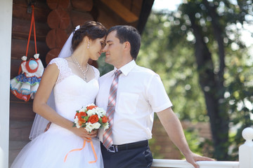 bride and groom at a wedding in summer nature