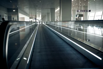 Printed roller blinds Airport long horizontal escalator at international airport terminal