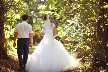 bride and groom at a wedding in summer nature