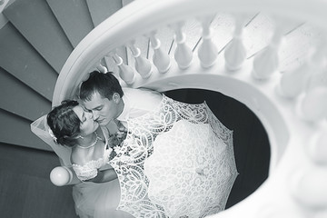 bride and groom portrait in the room