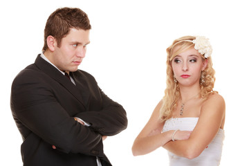bride and groom looking at each other offended