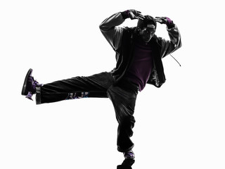 hip hop acrobatic break dancer breakdancing young man silhouette © snaptitude