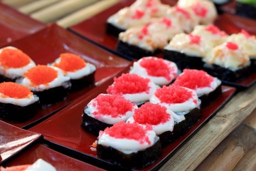 Japanese sushi - sushi egg, shrimp, crab stick, seaweed.