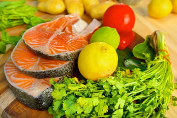 Delicious  portion of fresh salmon fillet with vegetables