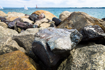 Stone shore. Background. Focus on foreground.