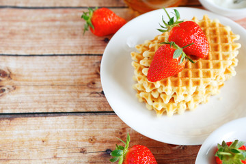 crispy waffles and strawberries