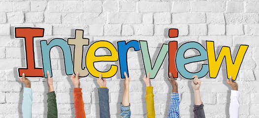 Group of Hands Holding Interview Word Concepts