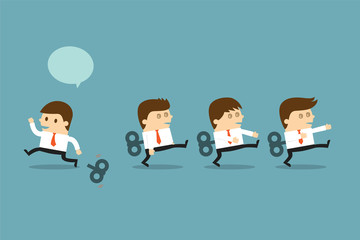 Businessmen with wind-up key