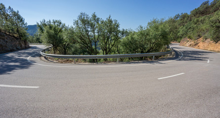 Mountain hairpin bend curved road