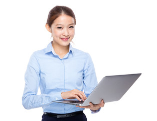 Businesswoman use of laptop