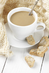 Coffee with cookies and knitwear