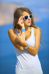 beautiful girl posing on the coast