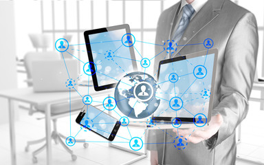 Business man using tablet PC and smartphone social connection