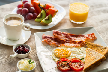 Continental breakfast with fresh fruit and coffee.