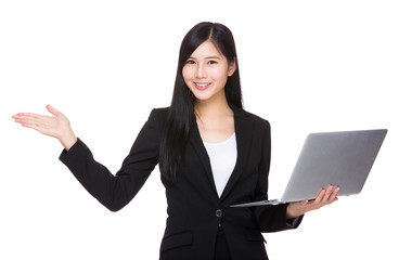 Businesswoman use of laptop and open hand palm