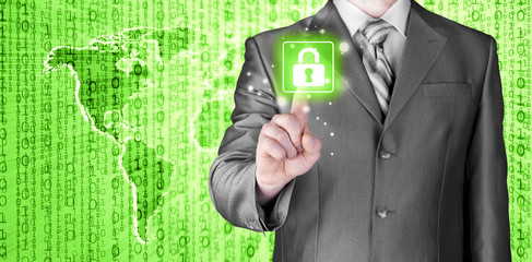 Businessman touch lock on world map  background