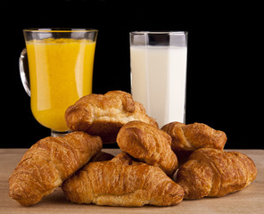 orange juice and milk and croissants