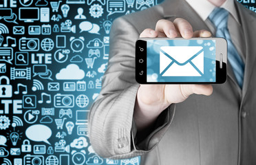 A man holding smartphone with one new message on a screen.