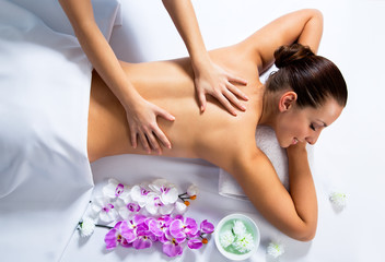 Young beautiful woman in spa environment