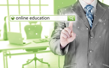 Online education written in search bar on virtual screen.