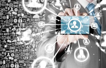 Business Hand holding a phone show the social network
