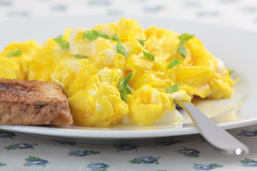 Scrambled eggs and toast.