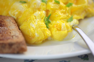 Scrambled eggs and toast.