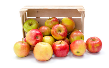 Ripe apples in wooden crate