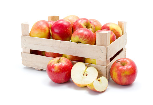 Ripe apples in wooden carte