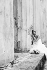 Beautiful ballerina in ancient colonnade