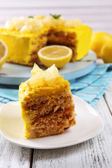 Tasty lemon dessert on wooden table