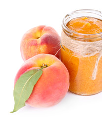 tasty peach jam with fresh peaches, isolated on white
