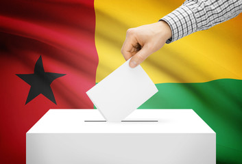 Ballot box with national flag on background - Guinea-Bissau