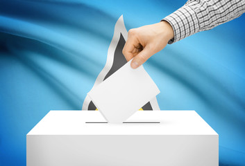 Ballot box with national flag on background - Saint Lucia