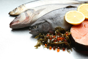 Fresh fish with lemon close-up